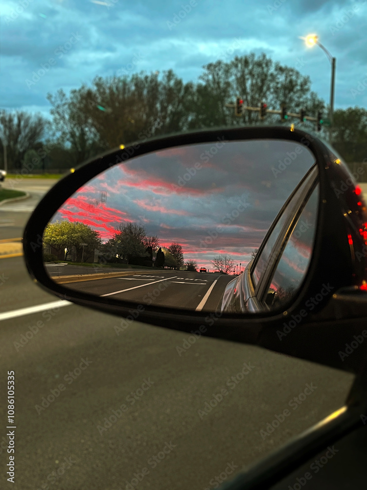 sunset through the side mirror sunset through the side mirror