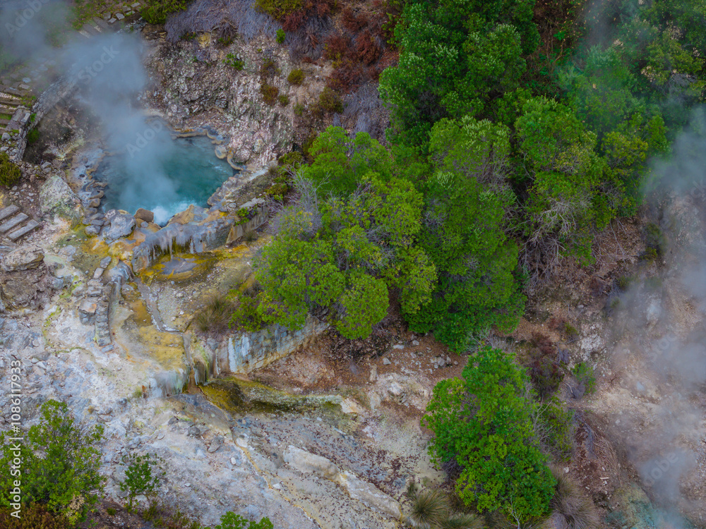 Furnas hot thermal springs, Sao Miguel Island, Azores, Portugal. Aerial drone view of Furnas village and Caldeira do Asmodeu Furnas hot thermal springs, Sao Miguel Island, Azores, Portugal. Aerial drone view of Furnas village and Caldeira do Asmodeu