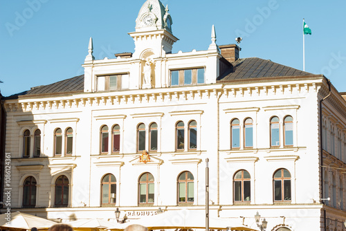 Photos A collection of vibrant urban and natural scenes featuring historic architecture, colorful facades, and serene green surroundings