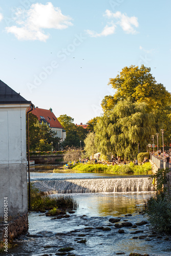 Tableau sur toile A collection of vibrant urban and natural scenes featuring historic architecture, colorful facades, and serene green surroundings