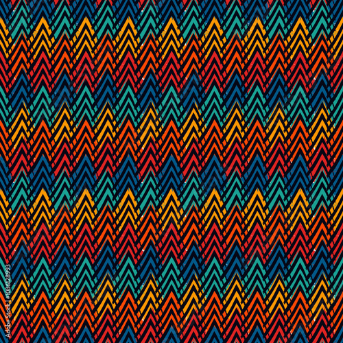 Paint brush zigzag lines. Hand drawn seamless pattern. Jagged stripes motif. Wavy linear ornament. Chevrons wallpaper. Striped backdrop. Geometric digital paper. Ethnic textile print. Tribal design.