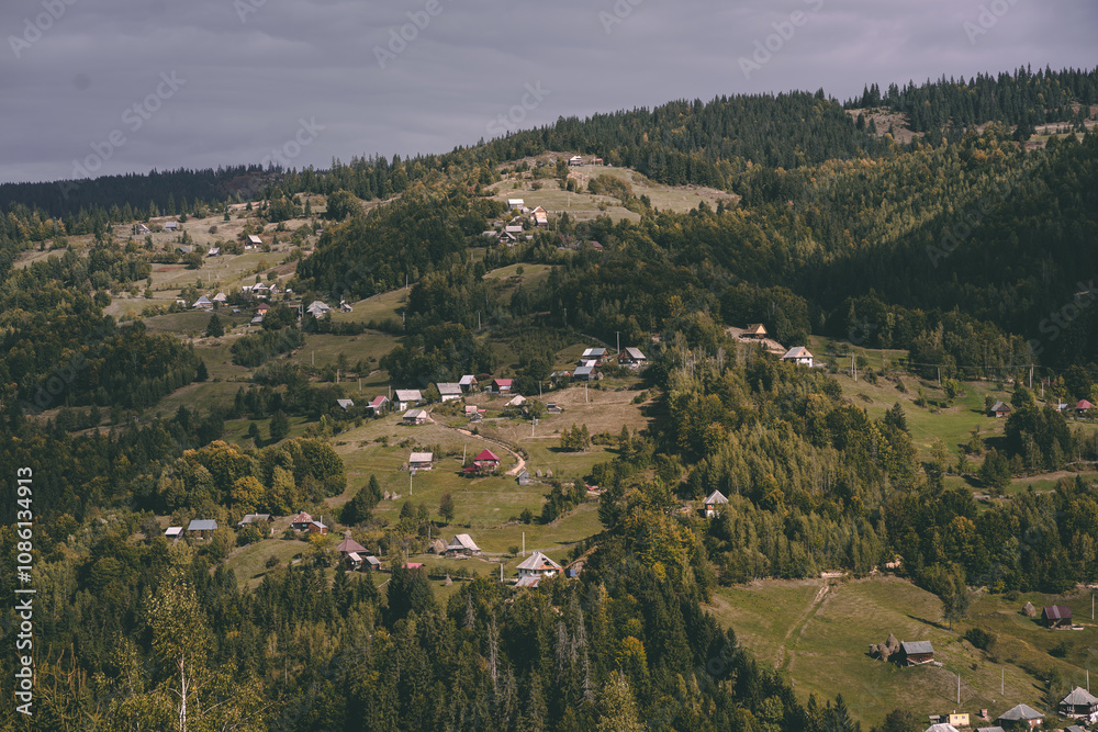 Fototapeta premium Misty Autumn Morning in a Mountain Village