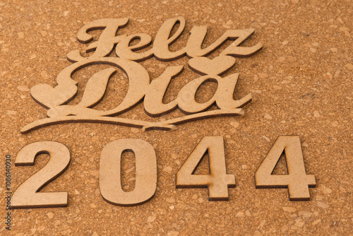 Happy new year 2044 on wooden background