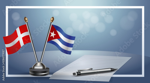 Denmark and Cuba National flags on small table with bokeh background, cooperative relationship