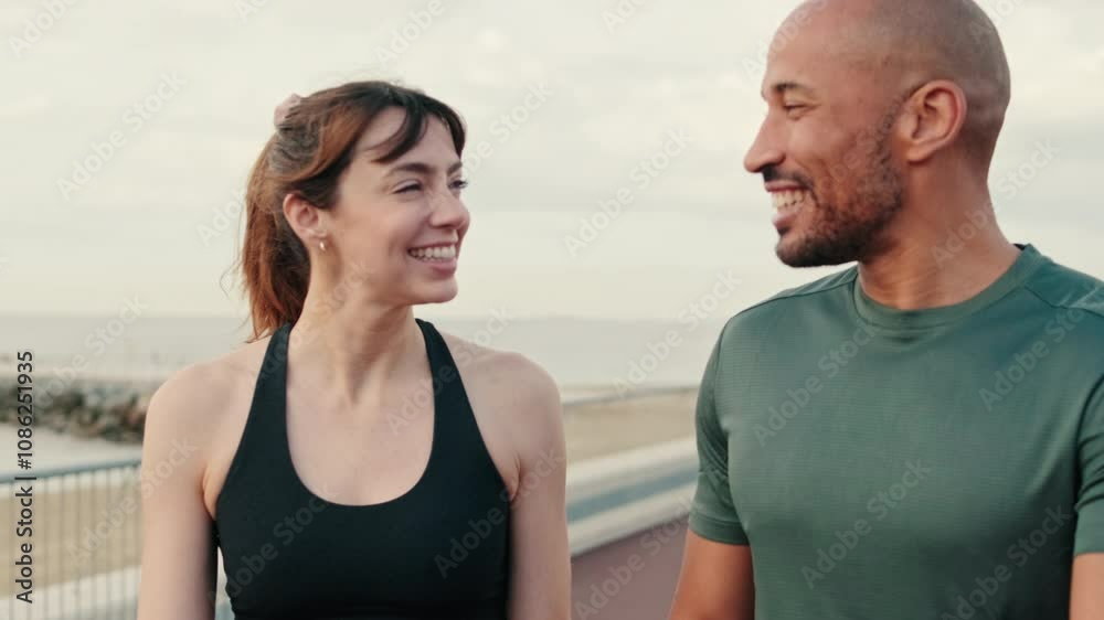 Close-up of dialogue between a man and a woman by the sea. Camera rolls around Close-up of dialogue between a man and a woman by the sea. Camera rolls around