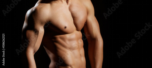 Fotografie Sportsman with good abs, six pack