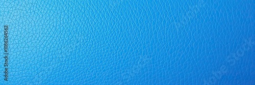 Blue embossed leather surface with a slight sheen and shine, nuanced appearance, light reflection, realistic texture photo