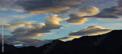 Unique shaped clouds at sunrise, Hawea, New Zealand. photo