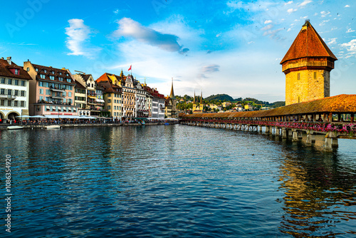 Lucern city with famous Chapel Bridge. Lucerne city view. Canton of Lucerne. Lucern Switzerland. Sunrise in historic city center of Lucerne with famous Chapel Bridge and lake Lucerne.