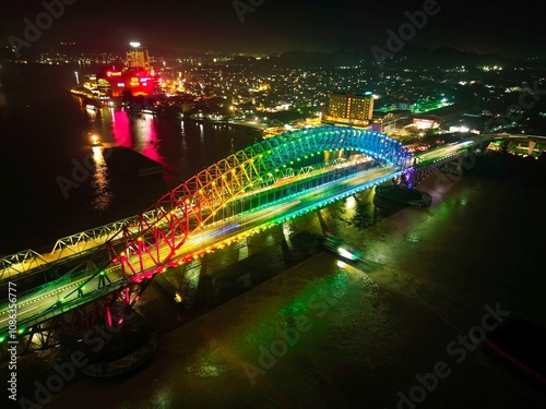 The appearance of the Mahakam Bridge from the air at night, the bridge is colorful like a rainbow at night in samarinda, east borneo