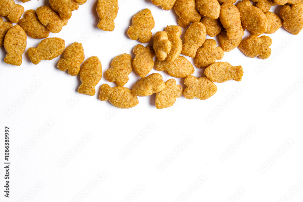 Scattered dry cat food isolated on white background Scattered dry cat food isolated on white background