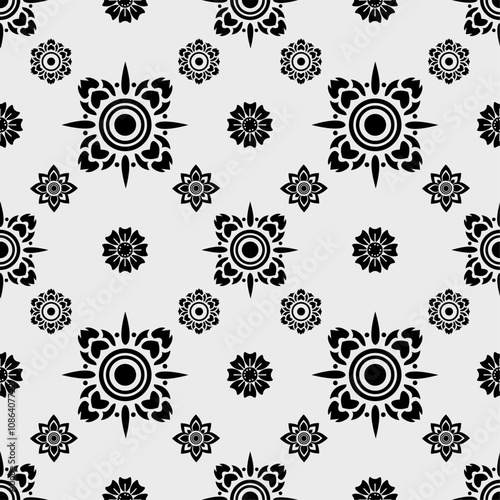 Black and white floral pattern with intricate designs and shapes, perfect for textiles or wallpapers