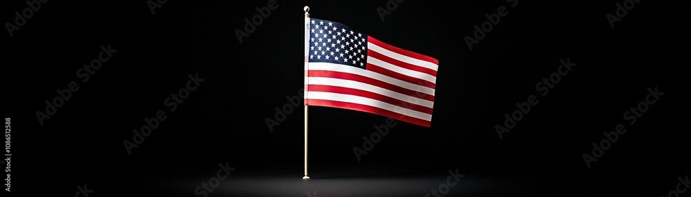 Fototapeta premium Waving USA flag in low light, contrasting dark background, Memorial or Independence Day theme, deep shadows and high detail