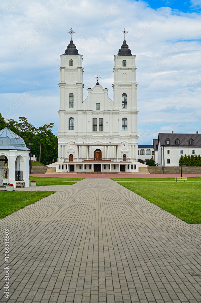 Famous pilgrimage site: Basilica of the Assumption of the Virgin Mary, Aglonas Vissvetakas Jaunavas Marijas Debesis Uznemsanas bazilika, exterior view of the church with garden in summer in Aglona,