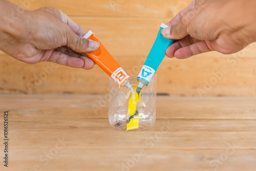 Mixing the epoxy glue for stick the steel part