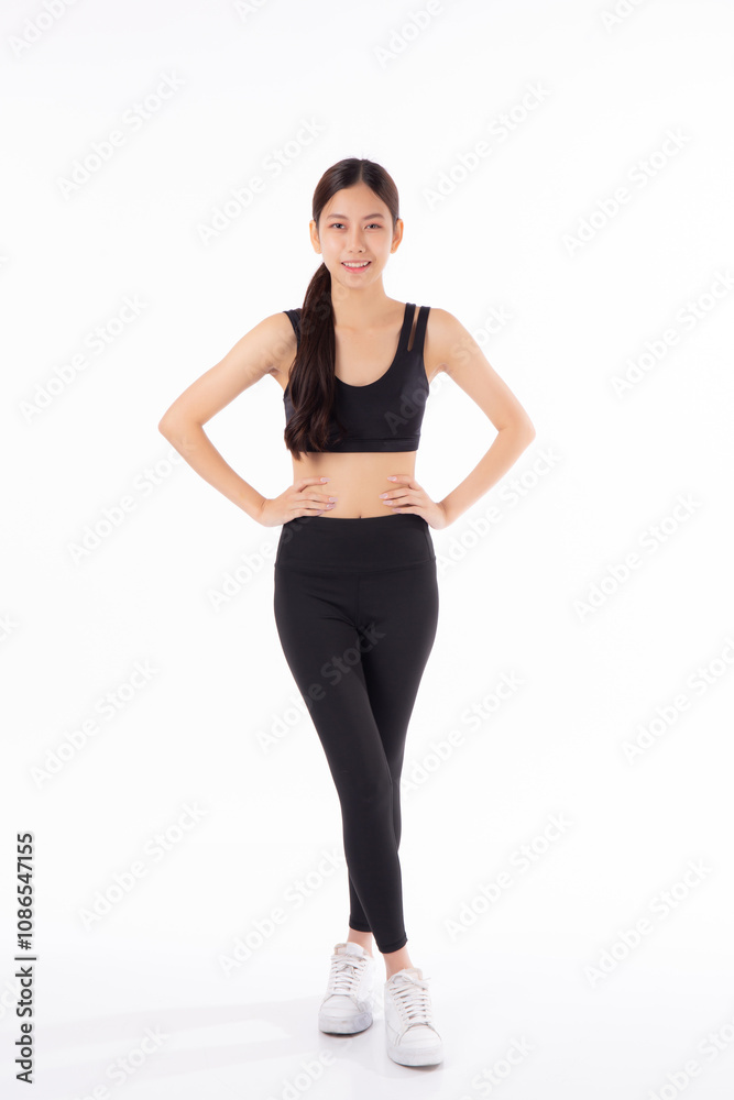 Portrait of beautiful young asian woman in sportwear smile and showing waist and abs isolated on white background, sport and exercise for health, female slimming with confident and wellness Portrait of beautiful young asian woman in sportwear smile and showing waist and abs isolated on white background, sport and exercise for health, female slimming with confident and wellness