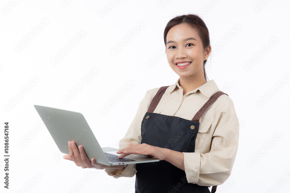 Portrait young asian business woman wearing apron holding laptop computer isolated white background, waitress or barista holding laptop computer with confident, cut out, business or freelance. Portrait young asian business woman wearing apron holding laptop computer isolated white background, waitress or barista holding laptop computer with confident, cut out, business or freelance.