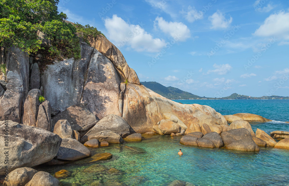 Naklejka premium Landscape view rocks with crystal turquoise sea at Lamai beach, Koh Samui island, Surat Thani province, Thailand