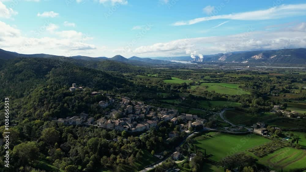 Mirmande, France - 1 November 2024: Panoramic view on a sunny day of the town of Mirmande - one of the most beautiful old towns in France. In the Rhones Alpes - Drome area. Mirmande, France - 1 November 2024: Panoramic view on a sunny day of the town of Mirmande - one of the most beautiful old towns in France. In the Rhones Alpes - Drome area.