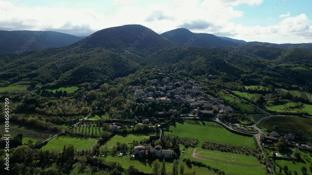 Mirmande, France - 1 November 2024: Panoramic view on a sunny day of the town of Mirmande - one of the most beautiful old towns in France. In the Rhones Alpes - Drome area. Mirmande, France - 1 November 2024: Panoramic view on a sunny day of the town of Mirmande - one of the most beautiful old towns in France. In the Rhones Alpes - Drome area.