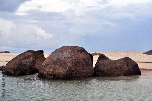 The beach on a small island in the Bangka Belitung Islands, Indonesia, the rocks arranged by nature look very beautiful and sturdy. photo