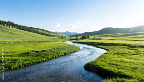 A tranquil river flows through vibrant green meadows under a clear sky in a peaceful landscape during the early afternoon