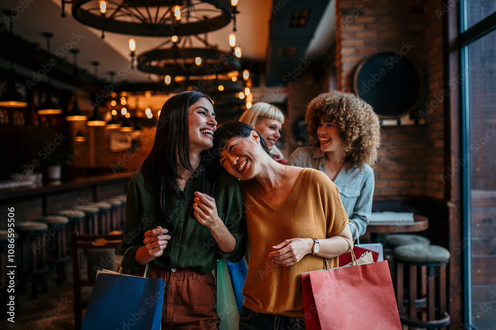 Obraz premium Beautiful women with shopping bags in the city cafe, shopping, tourism and happy people concept