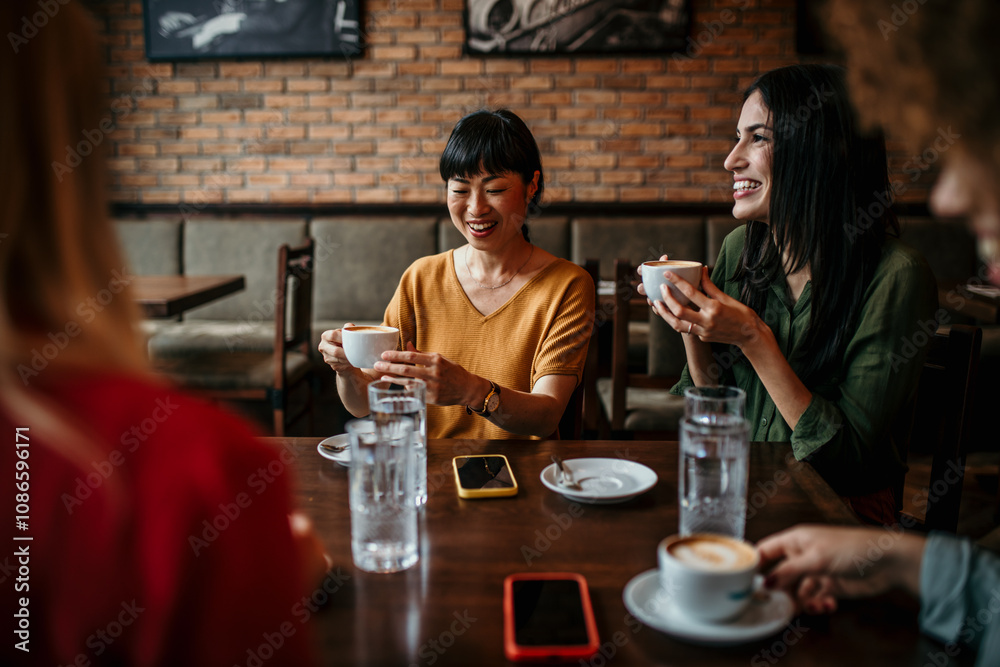 Happy young people enjoy coffee and chat, gathering in a relaxed and social environment. Happy young people enjoy coffee and chat, gathering in a relaxed and social environment.