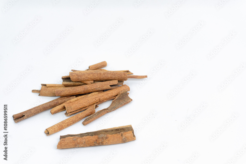 top view Cinnamon sticks isolated on white background. herb and spices concept. top view Cinnamon sticks isolated on white background. herb and spices concept.