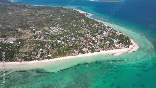 Bantayan island with turquoise waters, white sandy beaches, and lush coastal landscape, aerial view photo