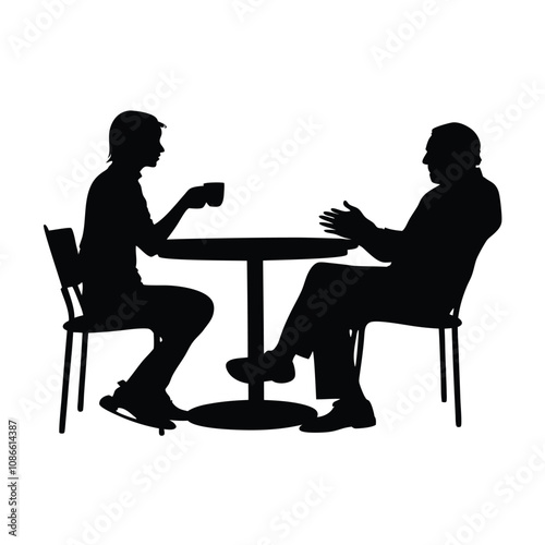 Two men sitting at a table. One man is drinking coffee. The other man is talking. There are two chairs