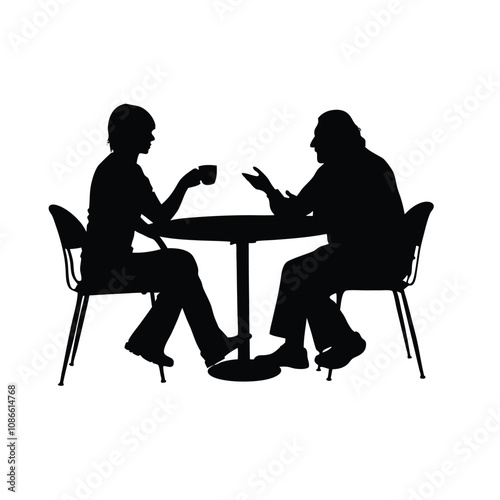 Two men sitting at a table. One man is drinking coffee. The other man is talking. There are two chairs