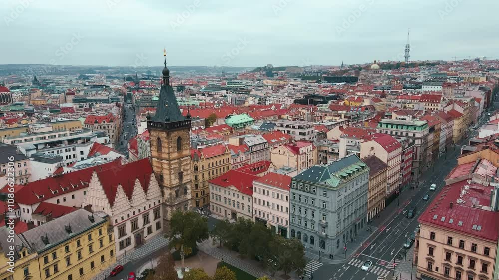 Prague architecture, aerial view. Flight over historical buildings with red roofs in European city. Birds eye view of cityscape of Praha, Czech Republic Prague architecture, aerial view. Flight over historical buildings with red roofs in European city. Birds eye view of cityscape of Praha, Czech Republic