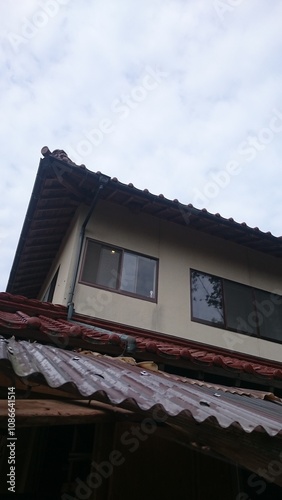 354)Japanese yellow hornet nest under the eaves of the second floor(Photo taken at 10:00. on august 19, 2015) vespa simillima xanthoptera photo