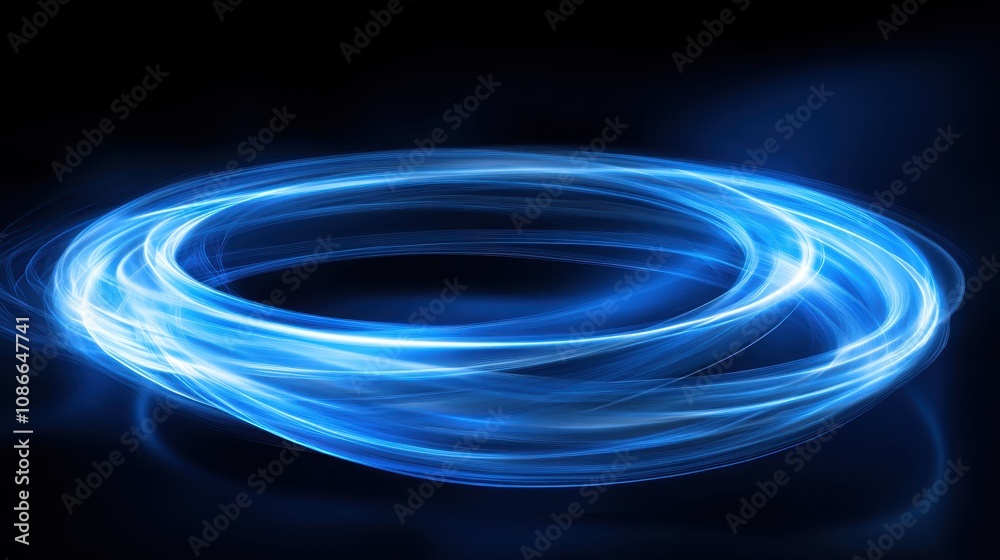 Naklejka premium A glowing blue circular motion against a dark background, creating a sense of dynamic energy and movement.