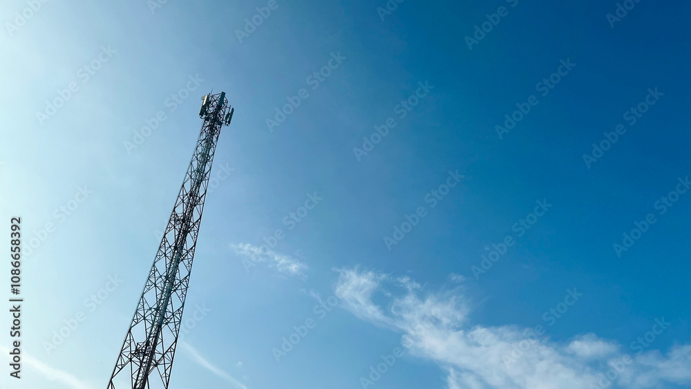 the internet tower is very high with blue sky background the internet tower is very high with blue sky background
