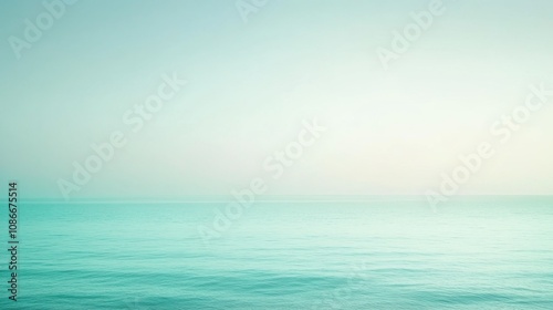 Tranquil Seascape with Serene Blue Waters and Gentle Waves Under Soft Light at Dusk, Creating a Peaceful Horizon and Calm Atmosphere for Relaxation and Reflection