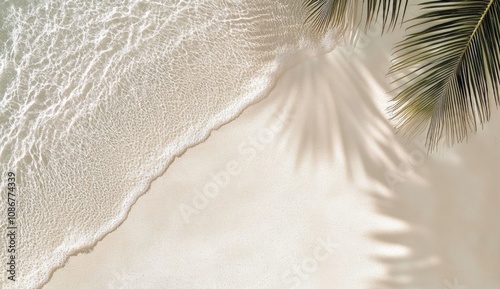 Fototapeta Naklejka Na Ścianę i Meble -  Tropical beach with palm leaf shadows on fine white sand and shimmering water reflection under sunlight