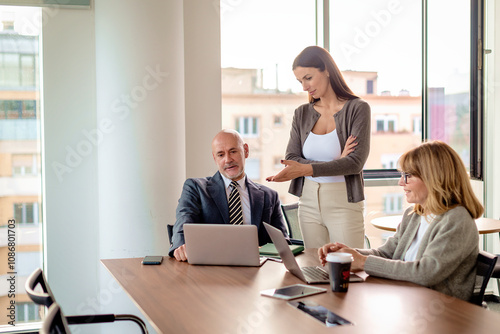 Business colleagues meeting in modern conference room
