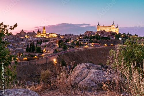 Sunset view of Toledo, Spain with Alcazar and Cathedral.