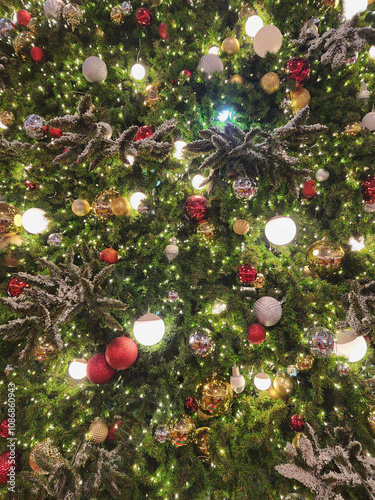 Christmas background with green spruce, illumination lights and fairy ball decorations. Merry Christmas background with christmas element.