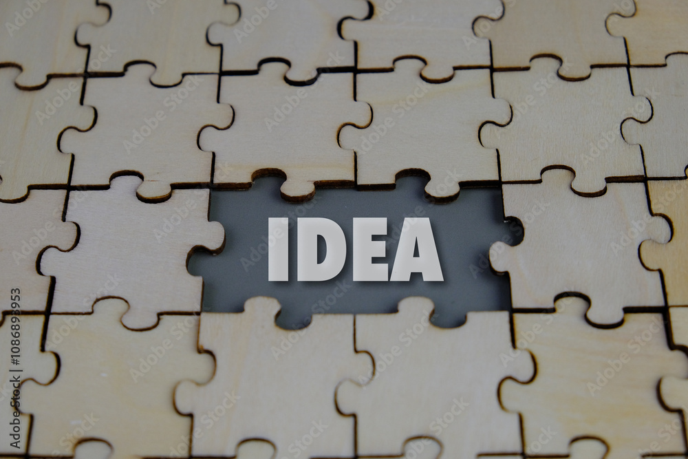 wooden puzzle with the word idea. concept idea. concept of thinking. Creativity, New idea, analytical thinking, inspiration concept, vision concept.