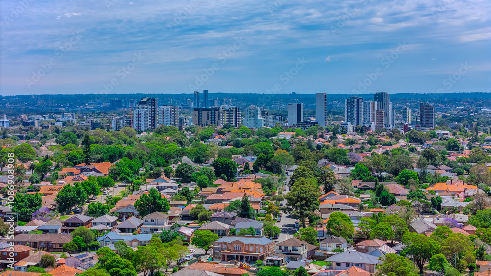 Fototapeta premium Panoramic aerial drone view of western Sydney Suburbs of Canterbury Burwood Ashfield Marrickville Campsie with Houses roads and parks in Sydney New South Wales NSW Australia