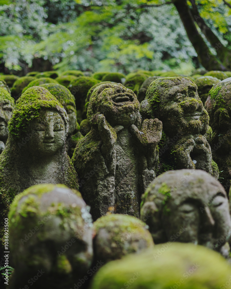 Sacred carved heads at a Kyoto shrine, showcasing traditional Japanese craftsmanship and spiritual significance. Sacred carved heads at a Kyoto shrine, showcasing traditional Japanese craftsmanship and spiritual significance.