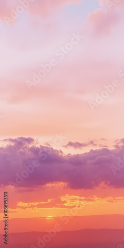 Abstract watercolor background depicting a vibrant sunset sky with shades of orange and purple, vibrant