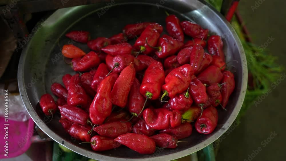 Big Red Chili Peppers At Market in South America. Close Up Big Red Chili Peppers At Market in South America. Close Up
