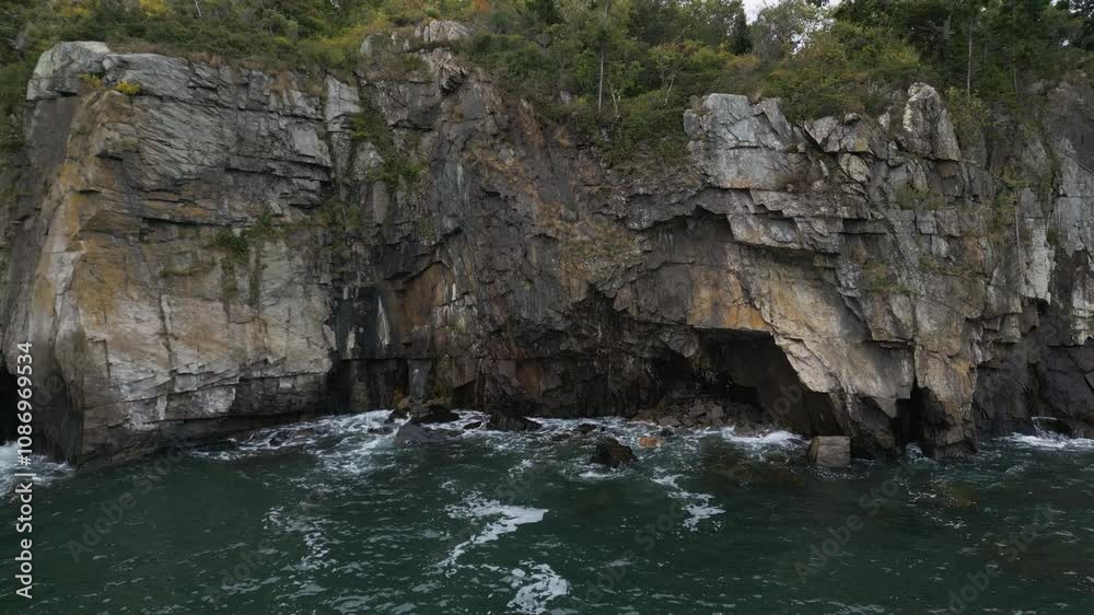 Watch Tower Over The Whitehead Peninsula With Rocky Cliff In Portland, Maine, USA. - aerial shot