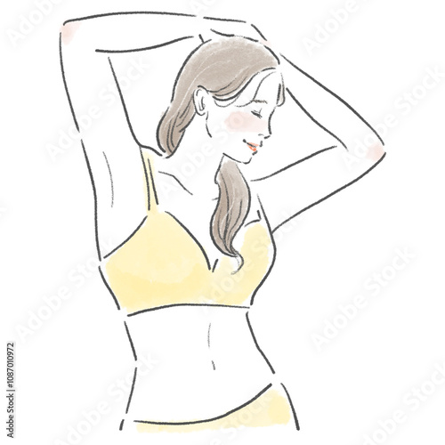 頭の上で手を組んでいるスタイルのいい若い女性の上半身