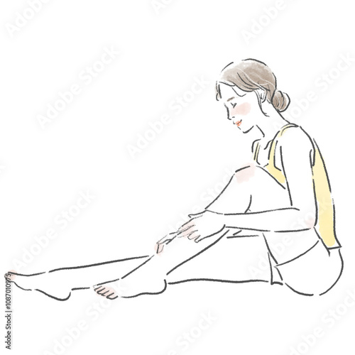 足のマッサージをしている若い女性の全身