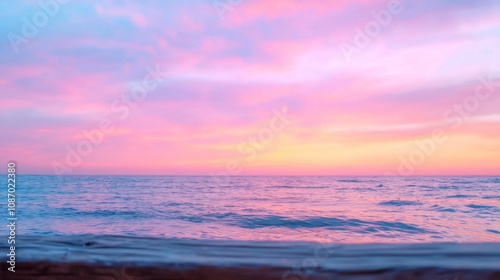 Sunset Serenity, a tranquil ocean scene where vibrant hues of orange, pink, and purple blend seamlessly in the sky, reflecting the calm waters below.